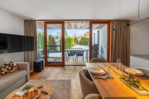 Modern garden apartment with sauna near ski lift